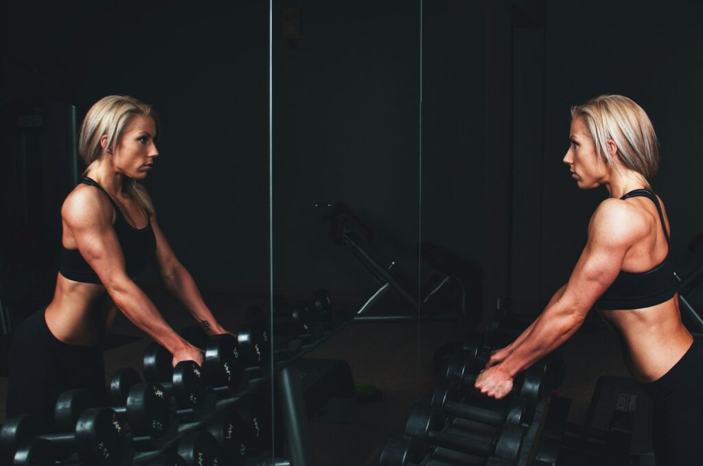 Woman strength training in a gym
