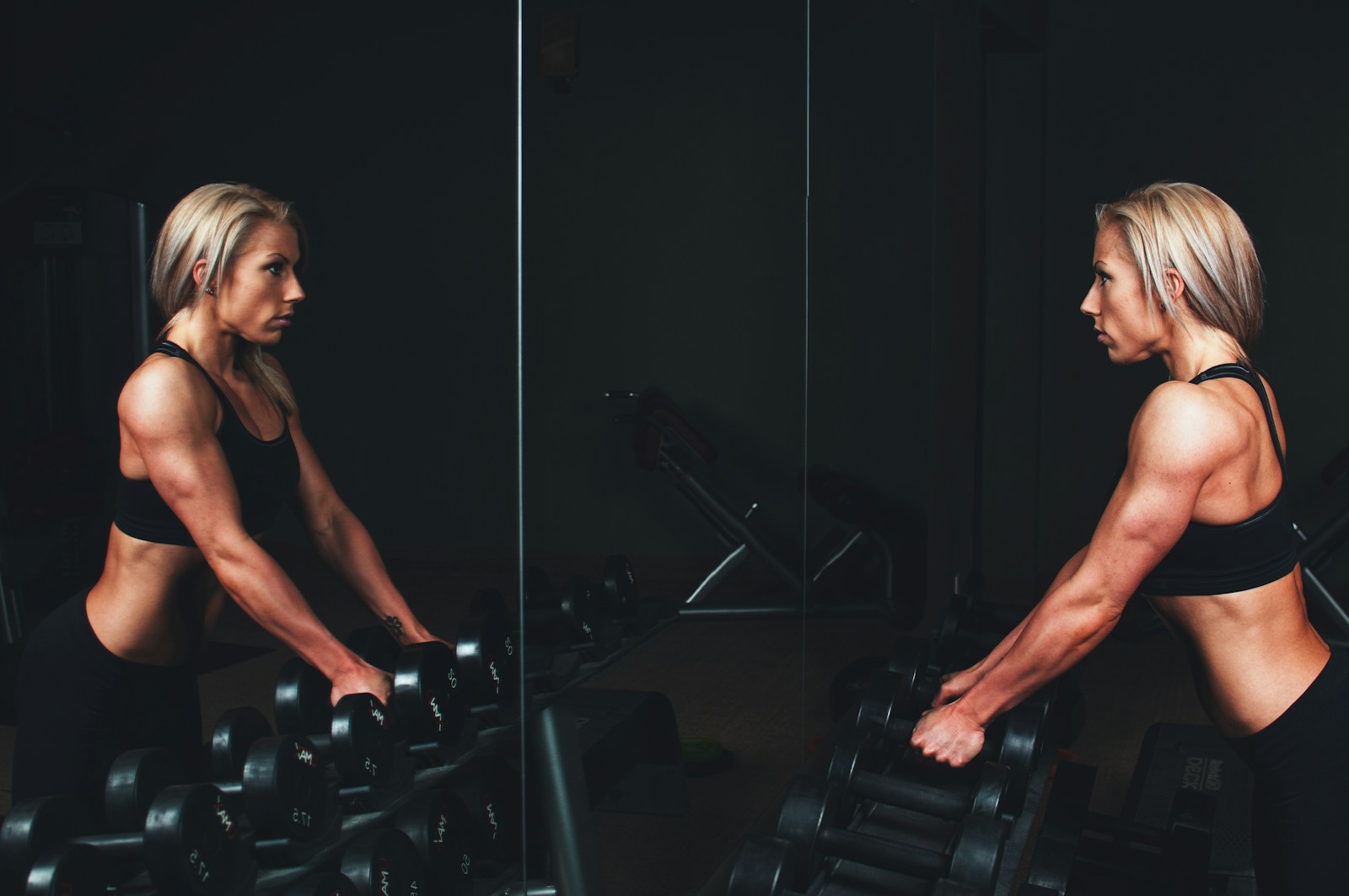Woman strength training in a gym